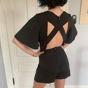 Black romper with cute cut out back
